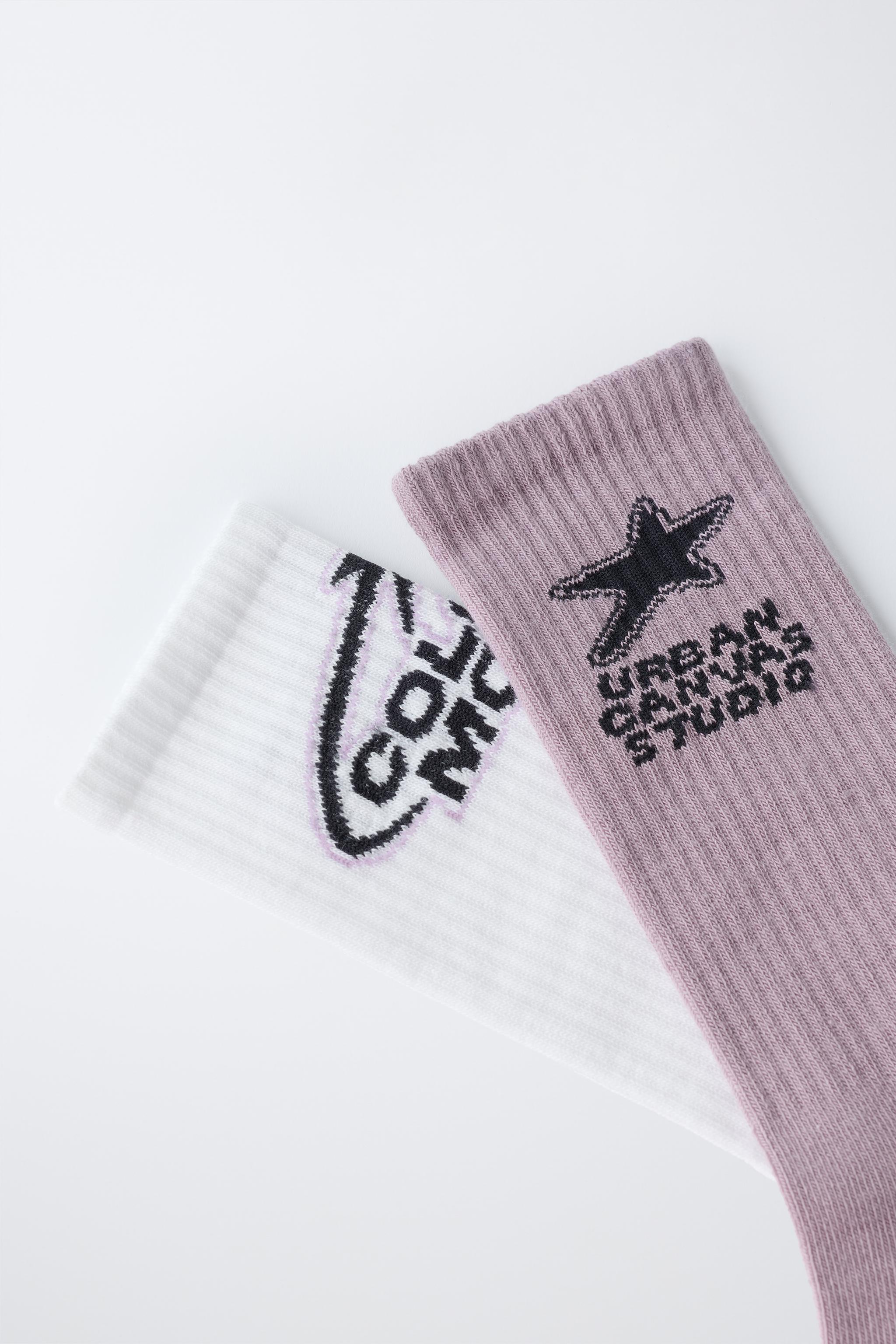 LOT DE DEUX PAIRES CHAUSSETTES LONGUES IMPRIMÉES